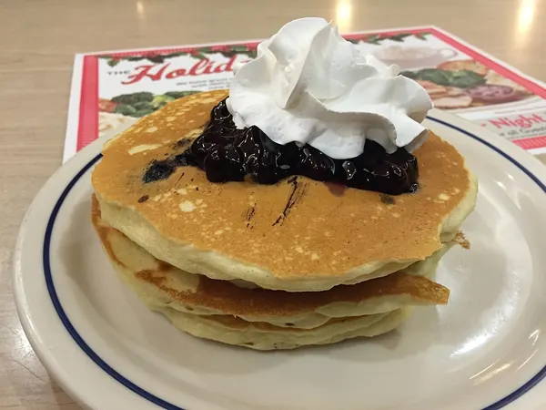 Photograph of blueberry, placed on top.