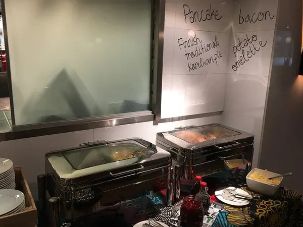 Photograph of hotel breakfast buffet stack.